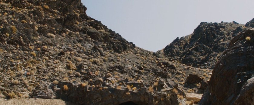 A rocky, desert hill.