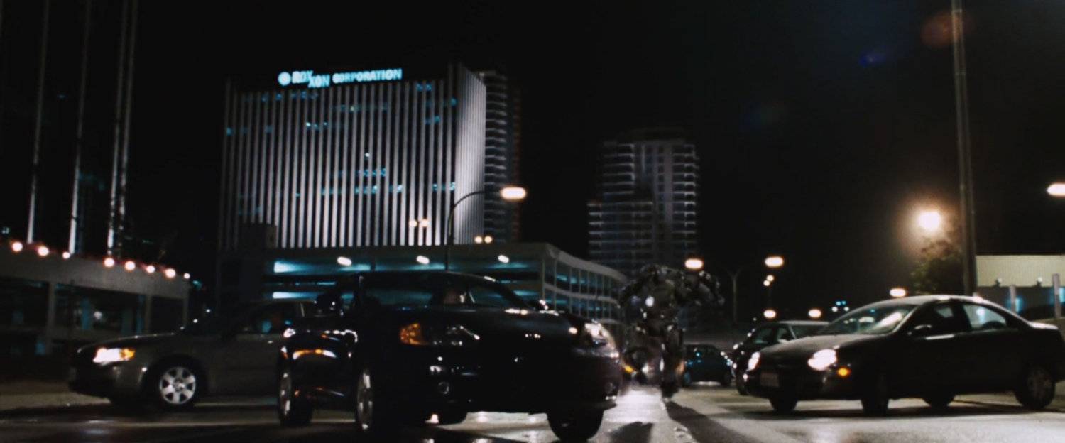 Iron Monger runs down Shoreline Drive amongst stopped cars.