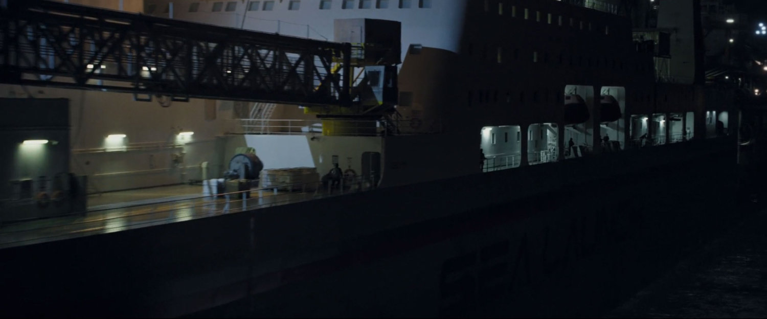 Nighttime shot of side of boat.