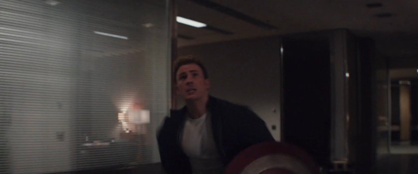 Steve Rogers running through office building.