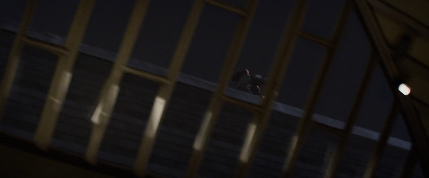 POV through skylight of Winter Soldier on the rooftop.