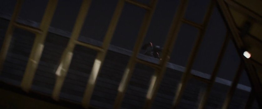 POV through skylight of Winter Soldier on the rooftop.