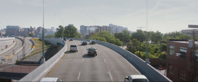 High angle shot of cars on freeway overpass.