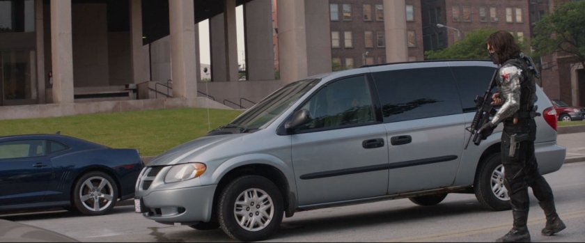 The Winter Soldier approaches a minvan.
