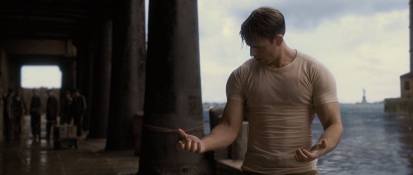 Steve Rogers admires his new physique at the docks.
