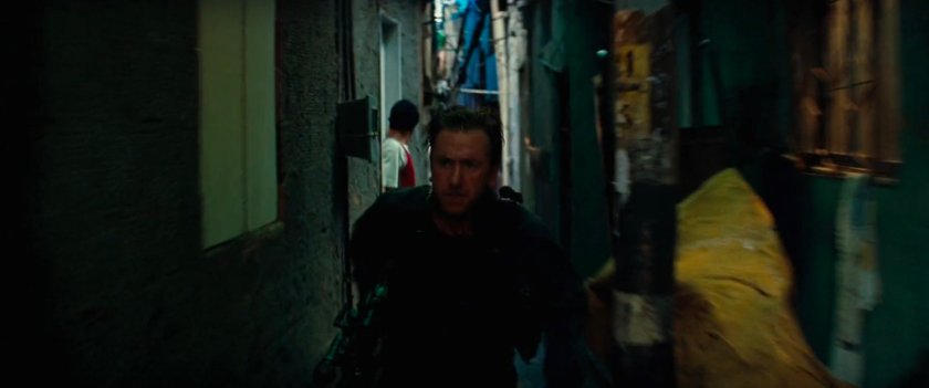 Emil Blonksy in tight favela alleyways.