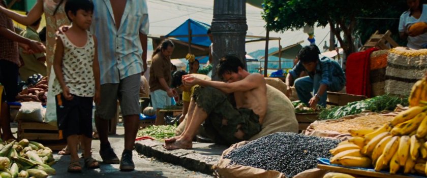 Bruce Banner begging for money at a open air market.