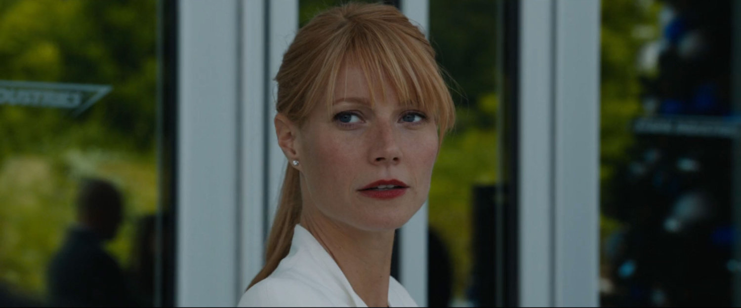 Pepper Potts outside the Stark Industries main doors.