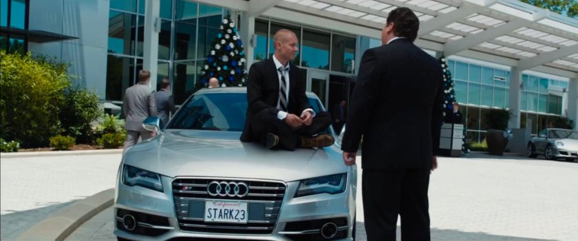 Deleted Scene, exterior of Stark Industries driveway with man sitting on car.