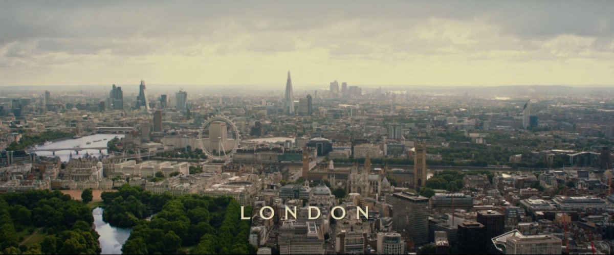 Establishing aerial shot of London. Text: London.