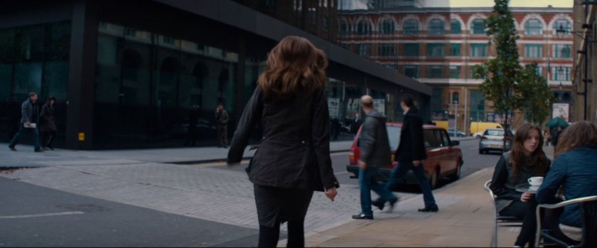 Jan Foster walks towards an intersection.