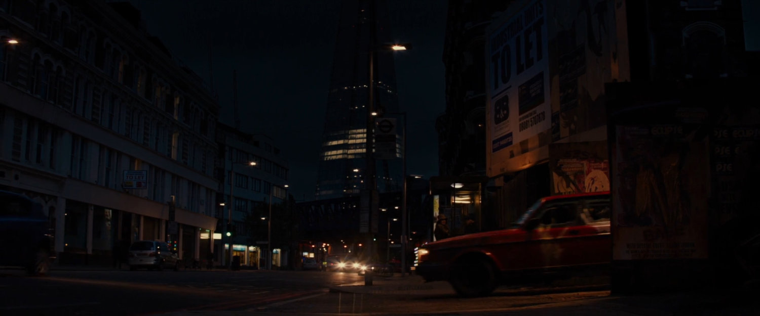 Nighttime view of London street.