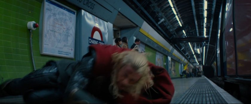 Thor laying on the platform for the Charing Cross tube station.