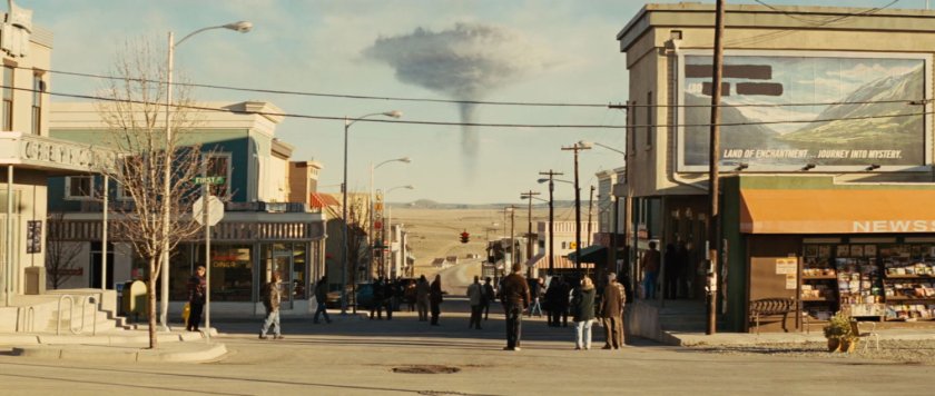 Mushroom cloud over desert as seen from Puente Antiguo street.