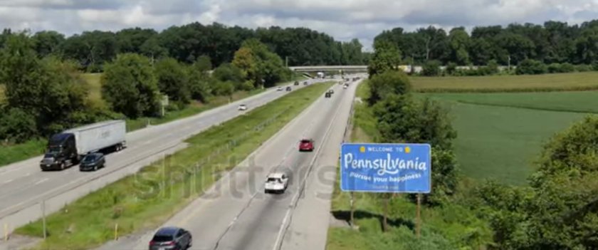 Stock footage still of Highway with Welcome to Pennsylvania sign.