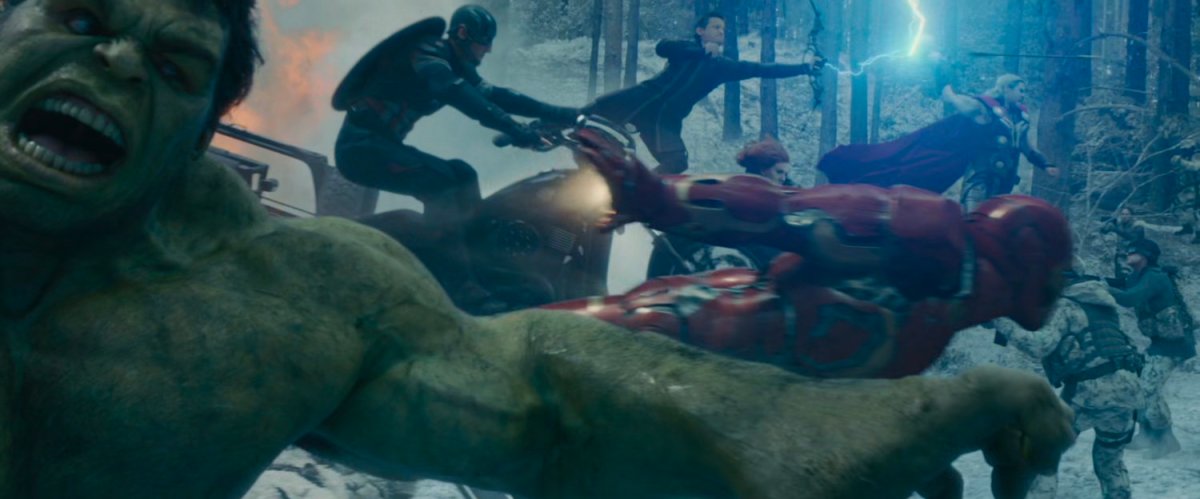 The Avengers race across a snowy landscape.
