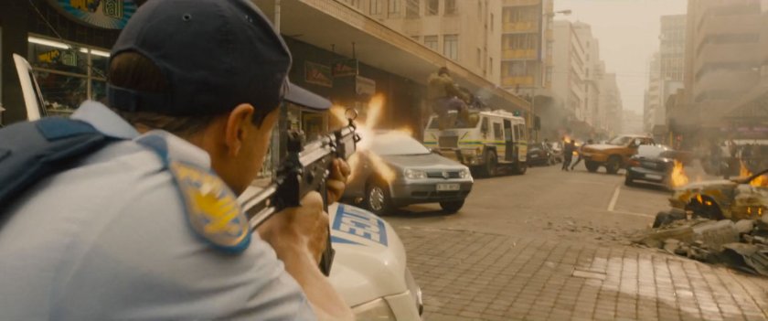 Police officer opens fire on The Hulk on a street.