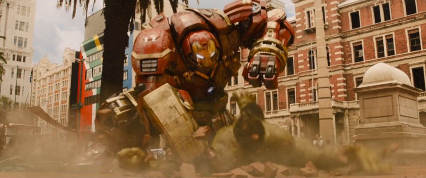 The Hulkbuster punches the Hulk repeatedly.