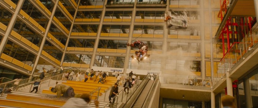 The Hulk and Hulkbuster fight crashes into a South African mall, as people flee.