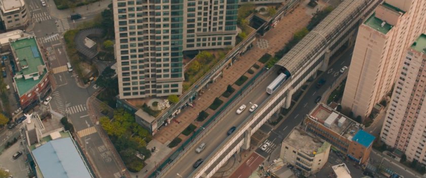 Aerial view of U-Gin truck on bridge.