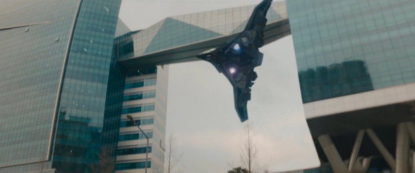 Quinjet flying past hi-tech building in Seoul Korea.