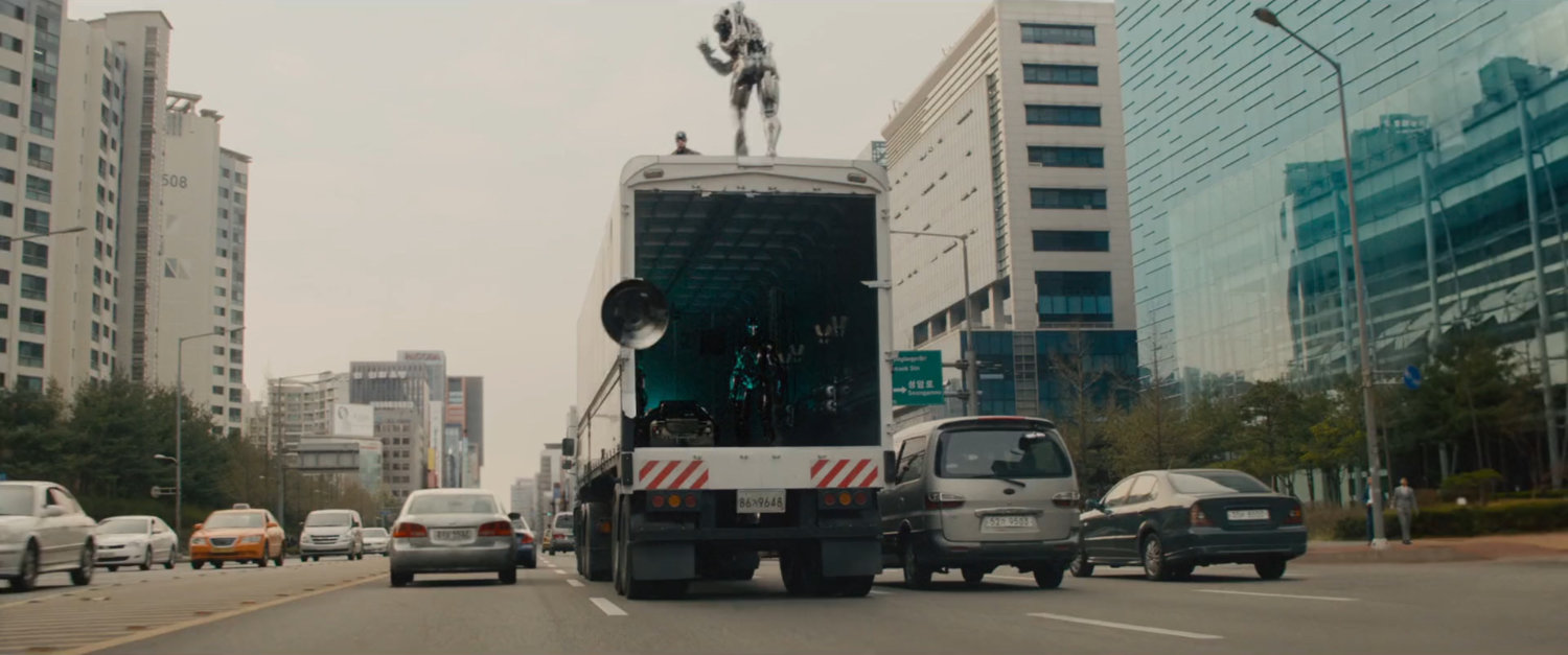 Captain America dropping his shield off a truck onto a Seoul Korea street.