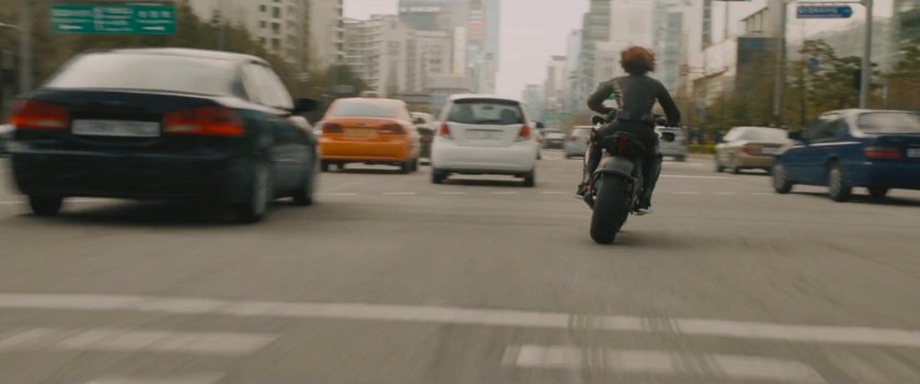 Black Widow on motorcycle on a Seoul Korea street.