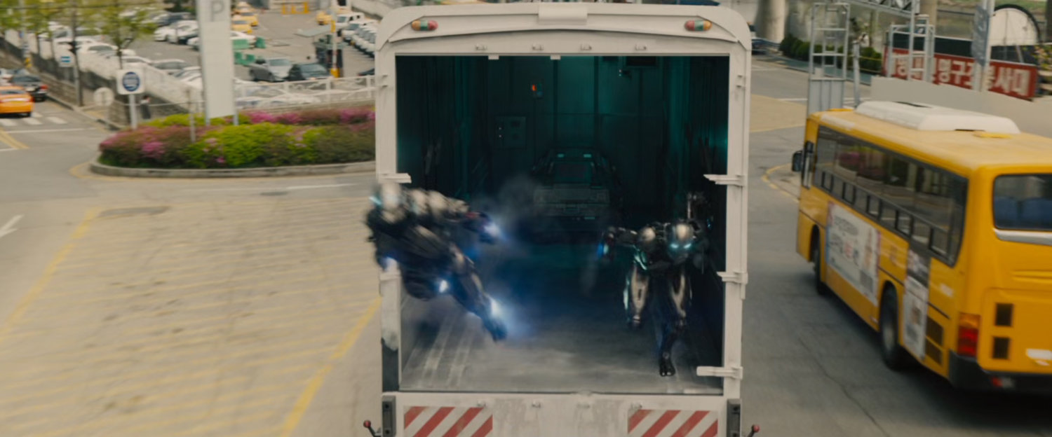 Ultron drones swarm out of back of storage truck.