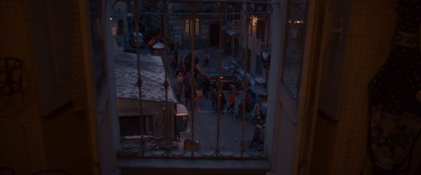 High angle of citizens evacuating a Novi Grad street.