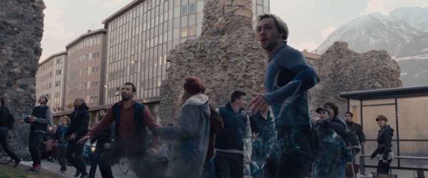 Quicksilver pauses by a dilapidated stone wall in a Novi Grad street.