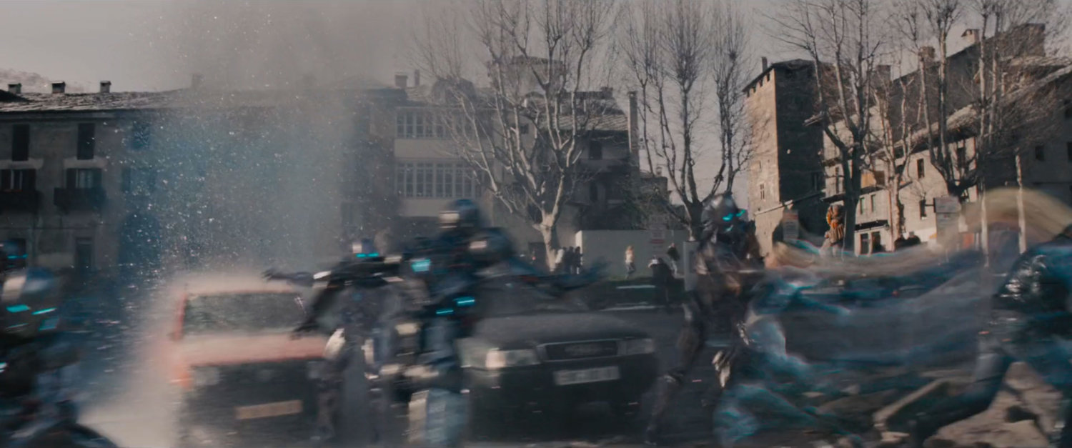 Quicksilver destroys Ultron drones in a parking lot.