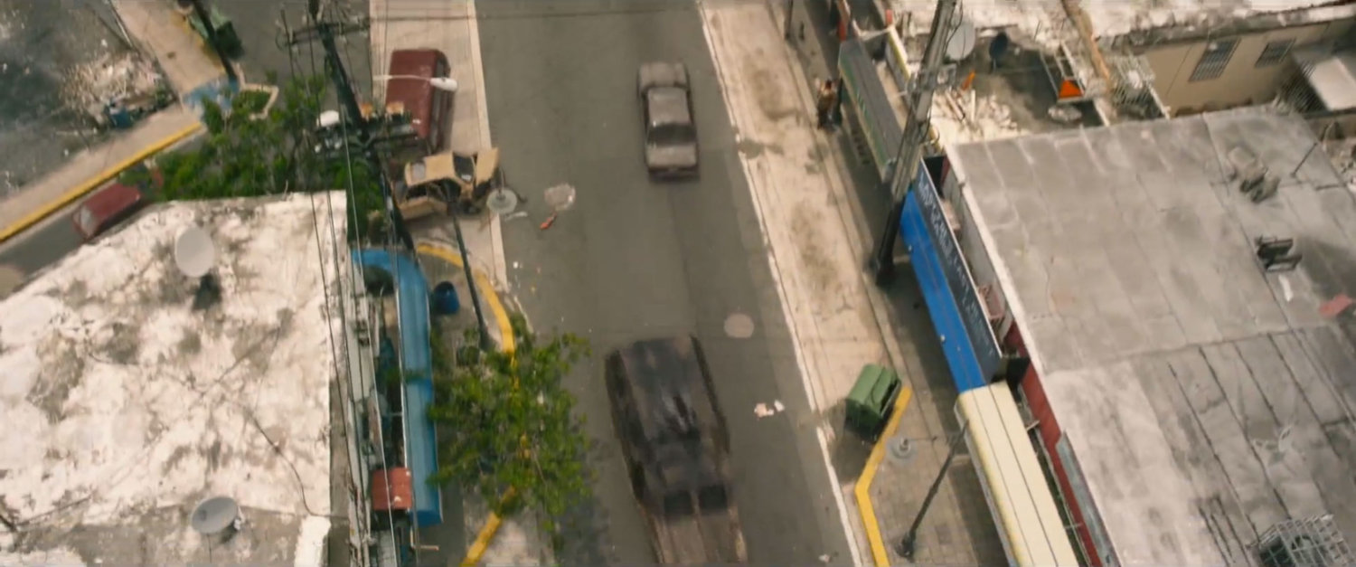 Aerial view of APC driving on Lagos street.