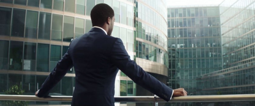 T'Challa looks out of a window at the United Nations complex.