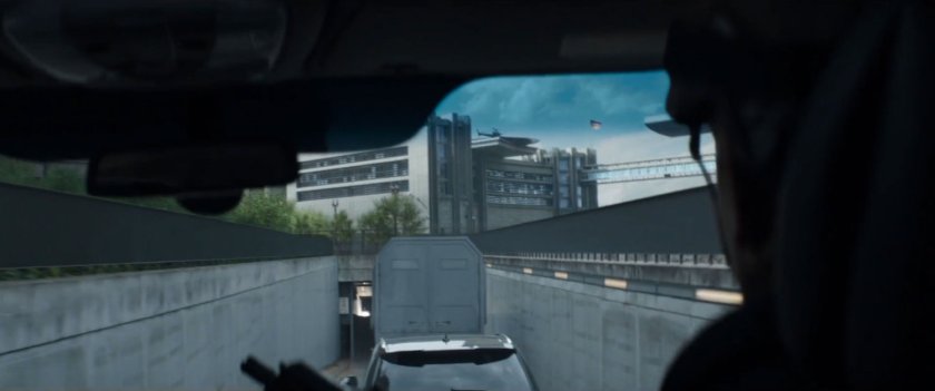 POV from truck of convoy heading into underground parking for Joint Counter Terrorist Centre.