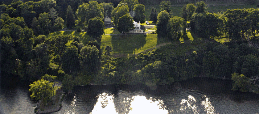 Aerial view of the Avengers Facility, switching between filming plate and digital finished location.
