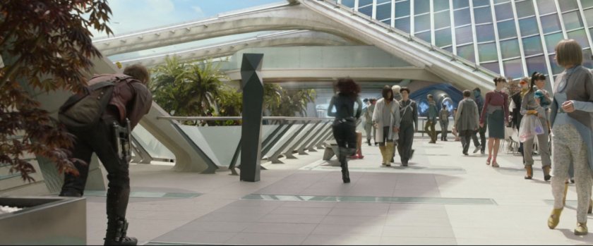 Gamora running along a walkway in the Xandar plaza.