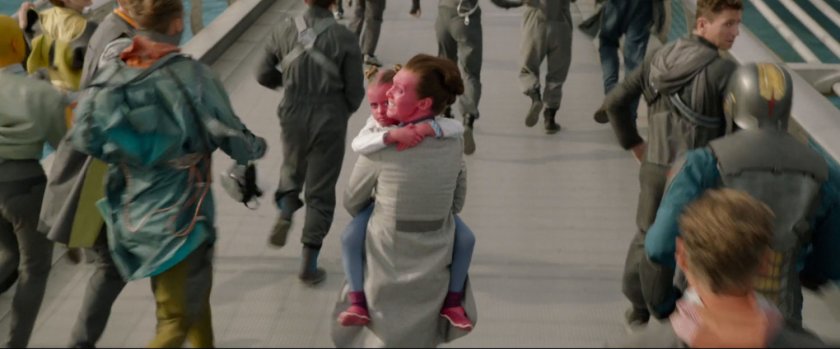 Civilians run across a Xandarian bridge.