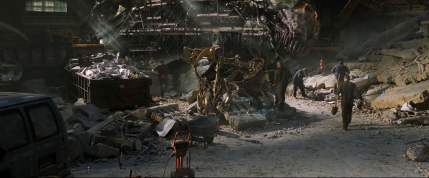 A chitauri leviathan and debris at the base of Stark Tower.