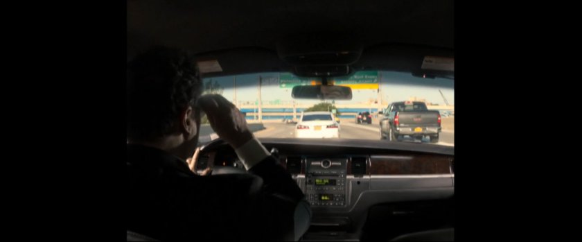 POV from backseat of car being driven by Happy Hogan on Long Island Expressway.