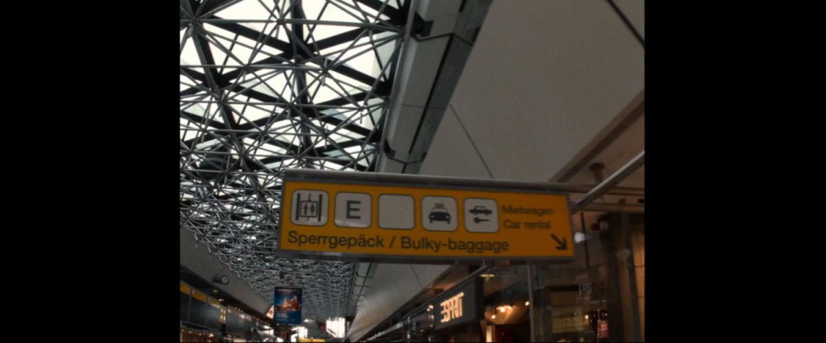 Ceiling and signage from Tegel airport in Germany.