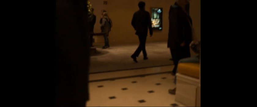 Checkered floor in hotel lobby.