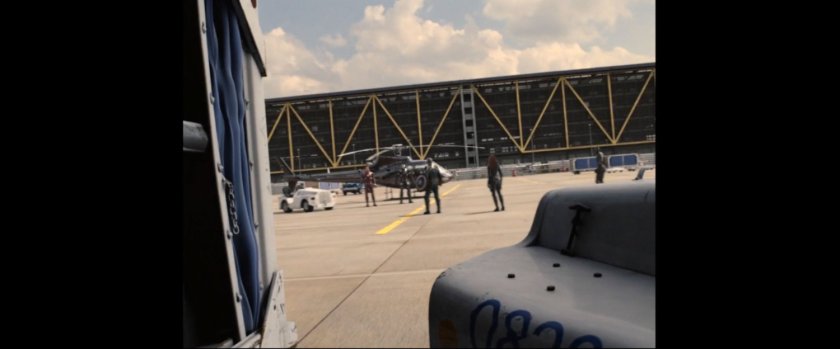 Captain America and Tony Stark discuss their differences on the tarmac at Leipzig/Halle airport.