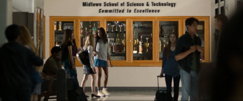 Students in Midtown High hallway near awards case.