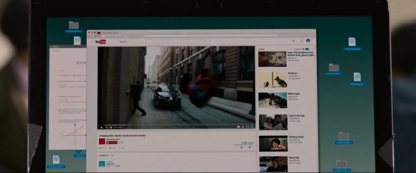 YouTube video of Spider-Man swinging down street.