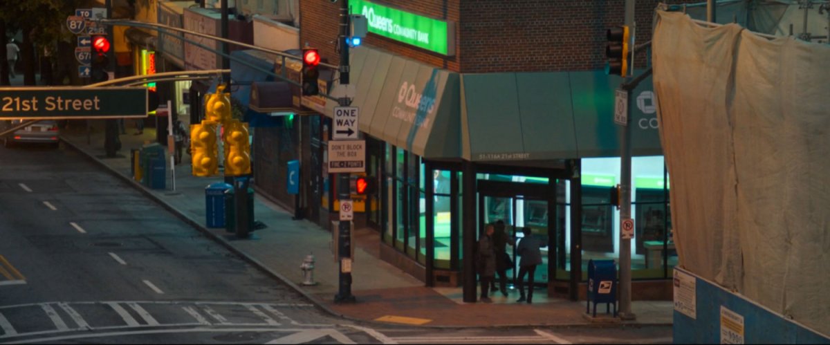 Exterior of Queen Community Bank on corner of 21st Street.