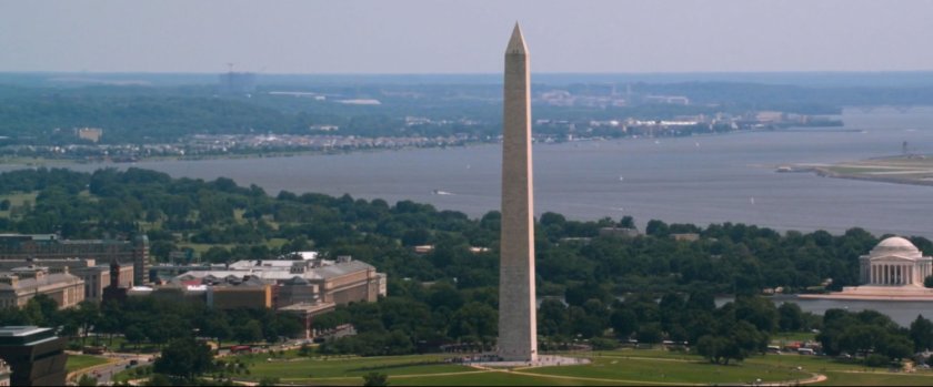 Aerial view of the Washington Monument, with Jefferson Memorial in distance..