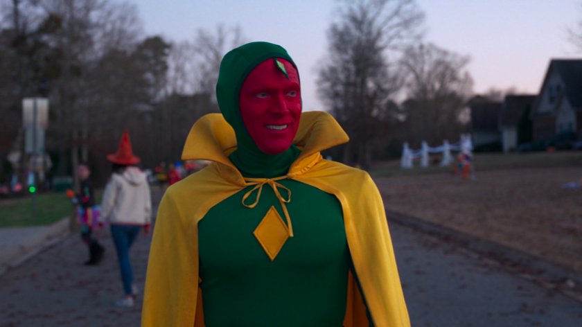 The Vision dressed in a Halloween costume on a neighborhood street.