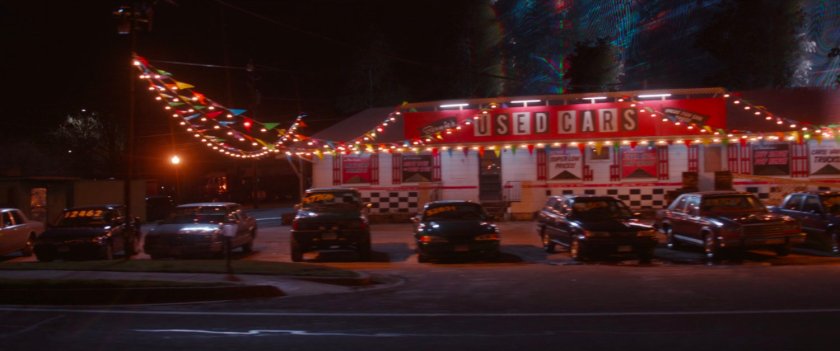 A 1950s looking used car lot.