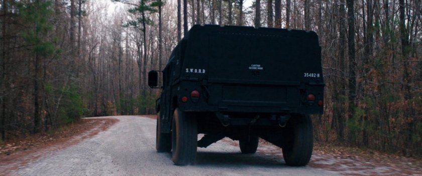 SWORD SUV on a gravel road.