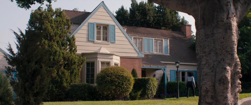 Monica outside Agnes's house.